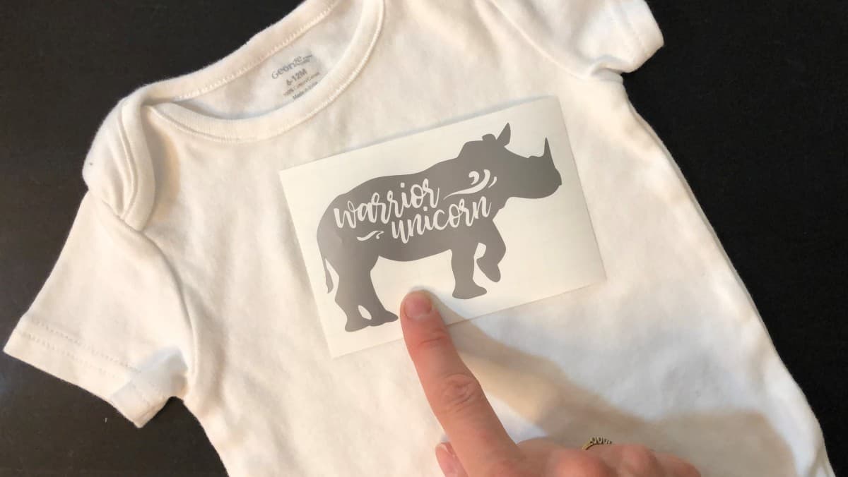 cricut adhesive vinyl on baby onsie shirt